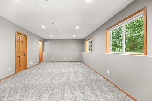 911 Hazelwood Ct, Buffalo, MN 55313 - carpeted empty room featuring recessed lighting and a smoke detector