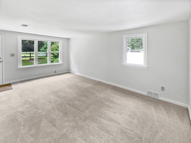 6043 17th St N, Oakdale, MN 55128 - carpeted spare room featuring healthy amount of natural light