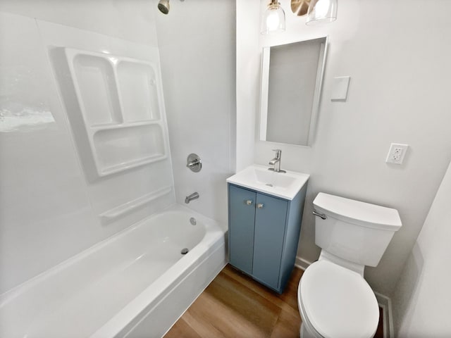 6043 17th St N, Oakdale, MN 55128 - bathroom with vanity, wood finished floors, and shower / washtub combination