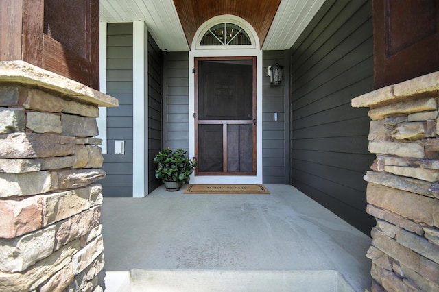 1570 Wood Duck Ln NE, Owatonna, MN 55060 - doorway to property featuring covered porch