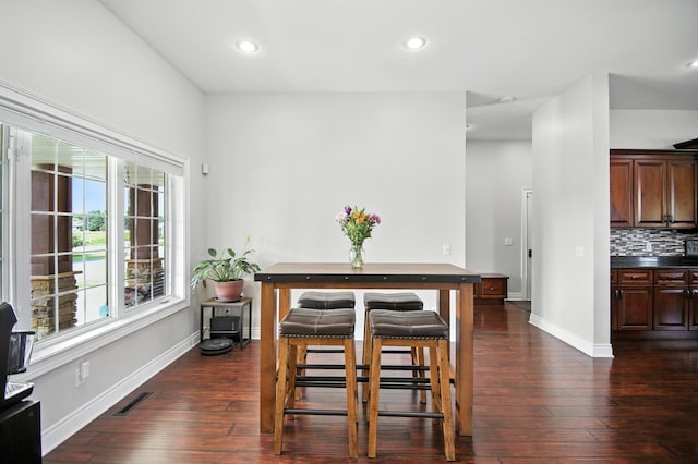 1570 Wood Duck Ln NE, Owatonna, MN 55060 - dining room featuring dark wood-style floors, plenty of natural light, and recessed lighting