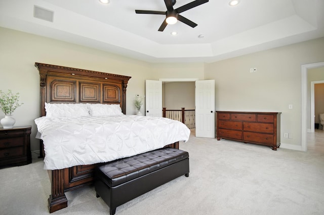 1570 Wood Duck Ln NE, Owatonna, MN 55060 - bedroom featuring light carpet, recessed lighting, a ceiling fan, and a raised ceiling