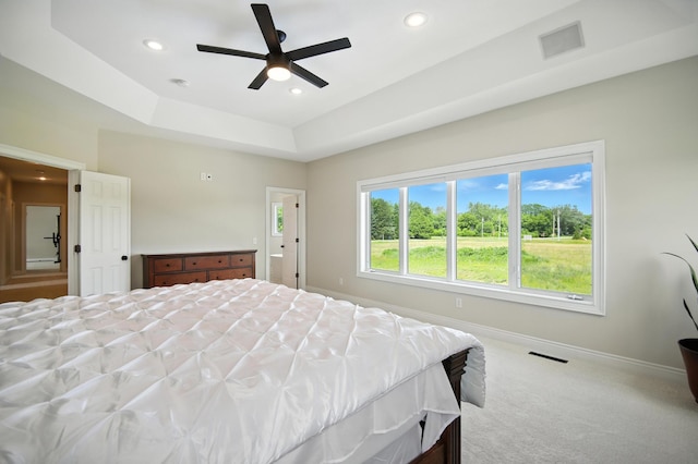 1570 Wood Duck Ln NE, Owatonna, MN 55060 - carpeted bedroom featuring recessed lighting, a raised ceiling, and ceiling fan