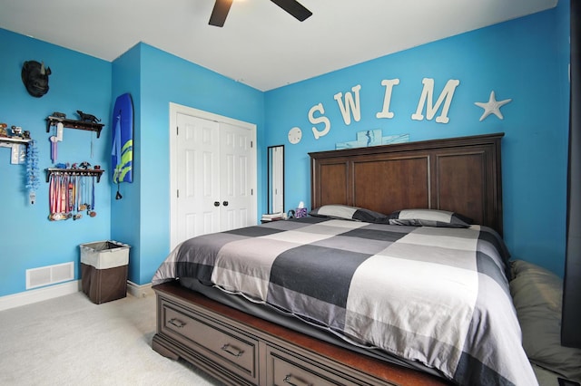 1570 Wood Duck Ln NE, Owatonna, MN 55060 - bedroom with light carpet, a closet, and a ceiling fan