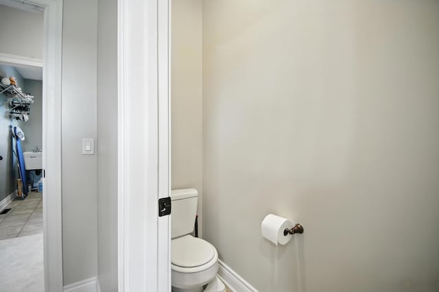 1570 Wood Duck Ln NE, Owatonna, MN 55060 - bathroom featuring toilet and baseboards