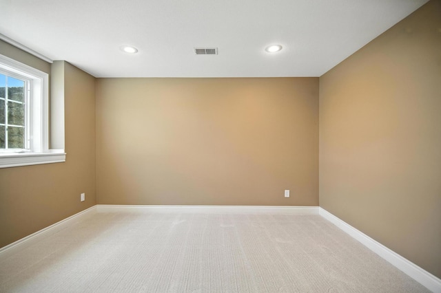 1570 Wood Duck Ln NE, Owatonna, MN 55060 - unfurnished room featuring recessed lighting and light carpet