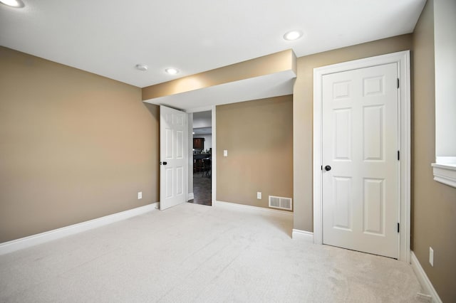 1570 Wood Duck Ln NE, Owatonna, MN 55060 - unfurnished bedroom with light colored carpet and recessed lighting
