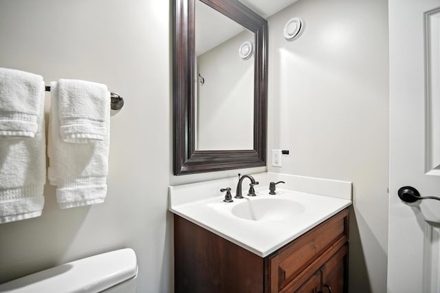 1570 Wood Duck Ln NE, Owatonna, MN 55060 - half bathroom featuring vanity and toilet