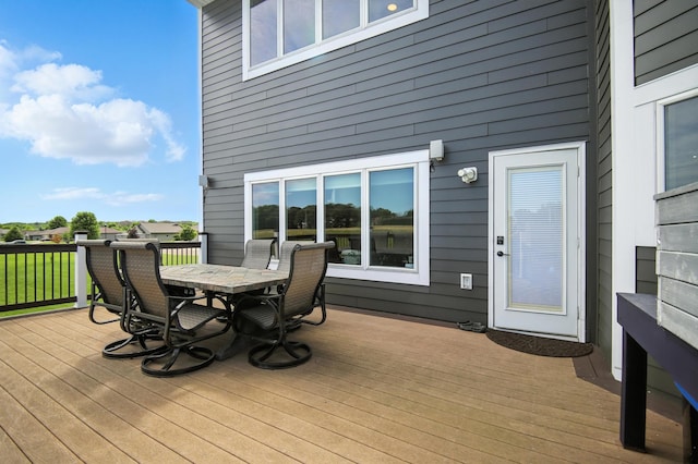 1570 Wood Duck Ln NE, Owatonna, MN 55060 - wooden deck featuring outdoor dining area