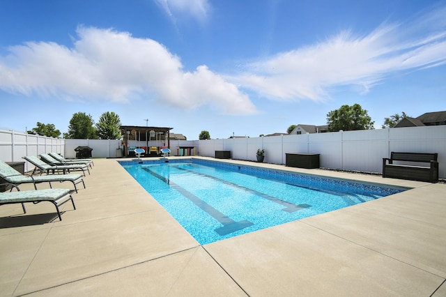 1570 Wood Duck Ln NE, Owatonna, MN 55060 - view of swimming pool featuring a patio area and a fenced backyard