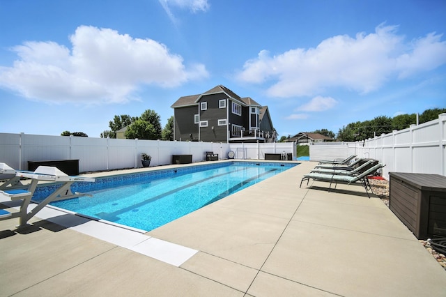 1570 Wood Duck Ln NE, Owatonna, MN 55060 - view of swimming pool featuring a fenced backyard and a patio