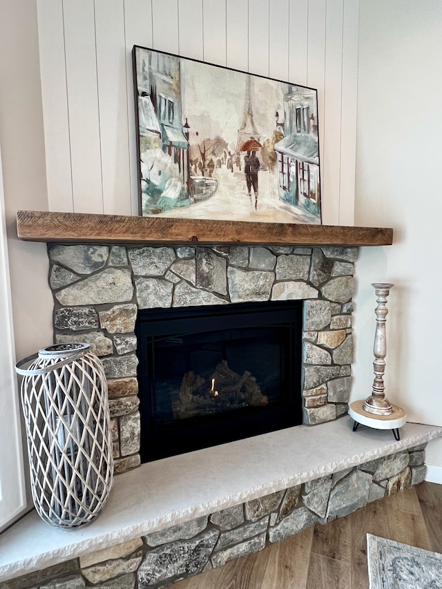 7591 255th St, Wyoming, MN 55092 - detailed view of a stone fireplace and wood finished floors