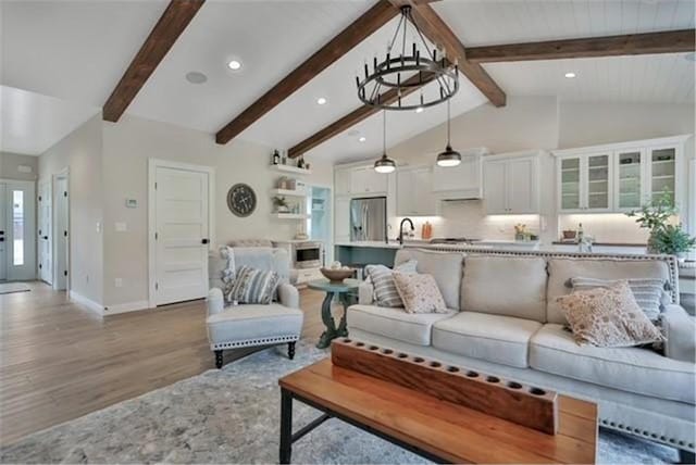 7591 255th St, Wyoming, MN 55092 - living area with wood finished floors, recessed lighting, and a chandelier