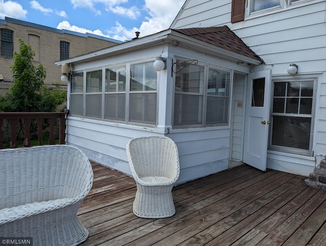 711 Main St N, Browerville, MN 56438 - deck with a sunroom