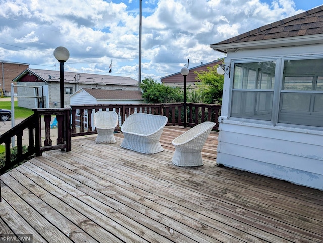711 Main St N, Browerville, MN 56438 - view of wooden terrace