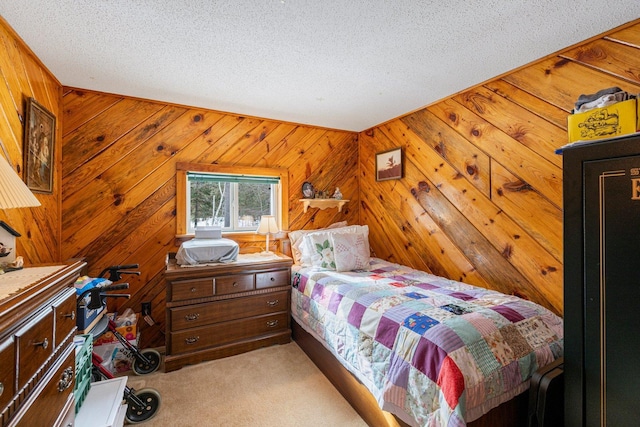 24621 Long Lake Rd, Bigfork, MN 56628 - bedroom featuring light colored carpet, a textured ceiling, and wood walls
