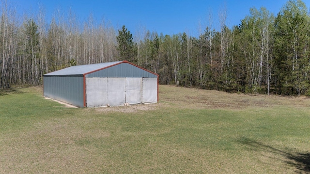 24621 Long Lake Rd, Bigfork, MN 56628 - view of outdoor structure featuring a view of trees