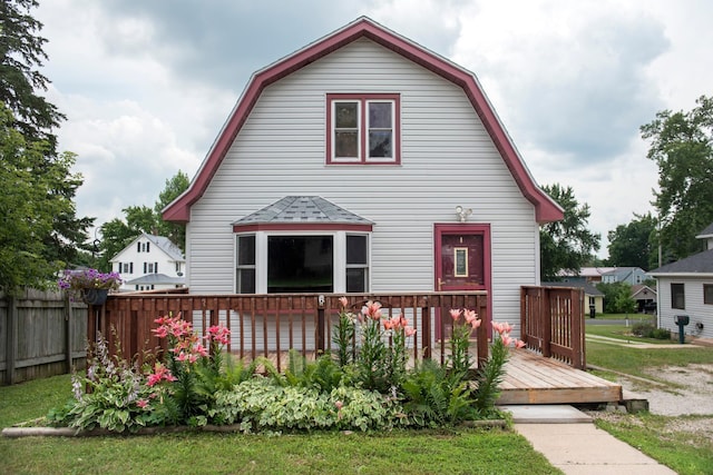 304 Pearl St, Spring Valley, MN 55975 - view of front of home with a gambrel roof and a deck