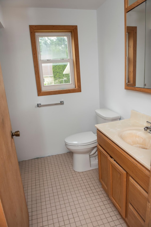 304 Pearl St, Spring Valley, MN 55975 - bathroom featuring vanity and tile patterned floors