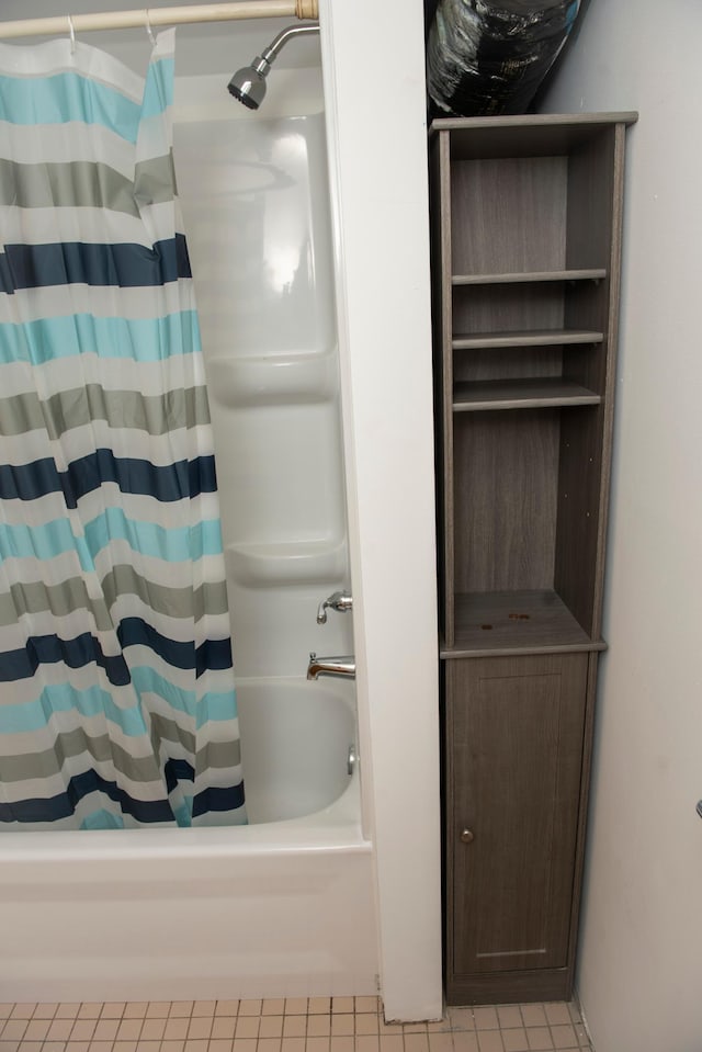 304 Pearl St, Spring Valley, MN 55975 - bathroom featuring shower / bath combo with shower curtain and tile patterned flooring
