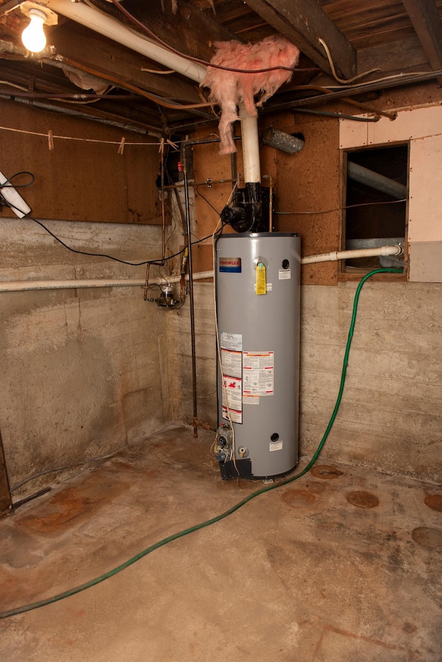304 Pearl St, Spring Valley, MN 55975 - utility room featuring water heater