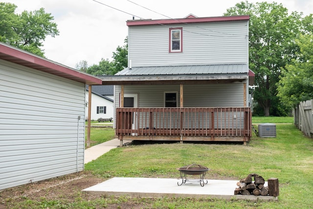 304 Pearl St, Spring Valley, MN 55975 - back of house with an outdoor fire pit and a patio area