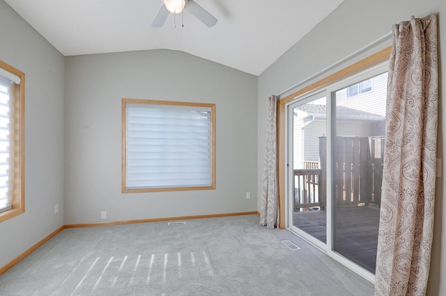9633 Belmont Ln, Eden Prairie, MN 55347 - unfurnished room with healthy amount of natural light, ceiling fan, carpet, and lofted ceiling