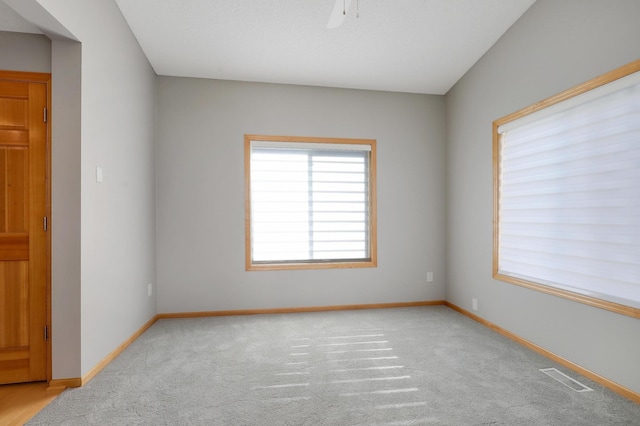 9633 Belmont Ln, Eden Prairie, MN 55347 - unfurnished room featuring carpet floors and a ceiling fan