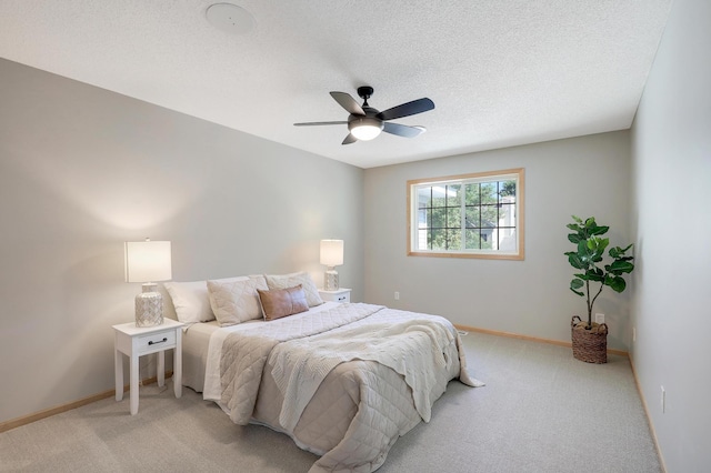 9633 Belmont Ln, Eden Prairie, MN 55347 - bedroom featuring light carpet, ceiling fan, and a textured ceiling