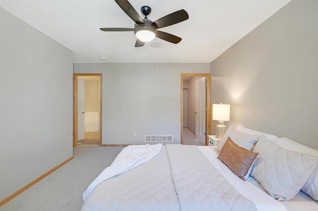 9633 Belmont Ln, Eden Prairie, MN 55347 - bedroom featuring carpet floors, a ceiling fan, and ensuite bathroom