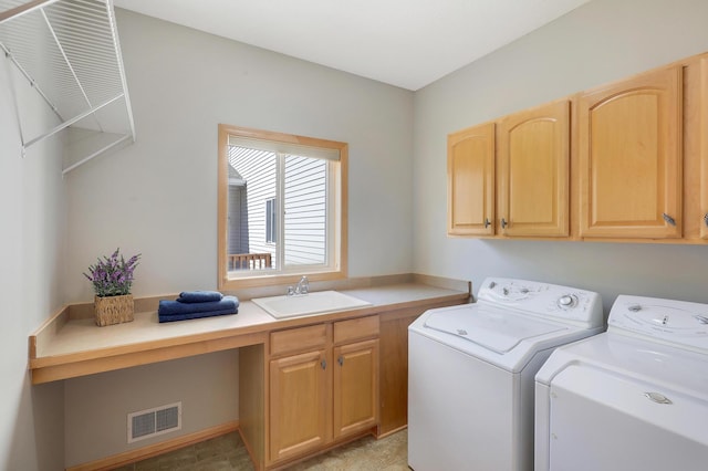 9633 Belmont Ln, Eden Prairie, MN 55347 - laundry room featuring independent washer and dryer and cabinet space