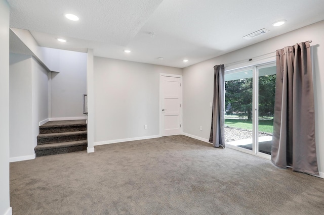 9633 Belmont Ln, Eden Prairie, MN 55347 - spare room featuring carpet flooring, recessed lighting, stairway, and a textured ceiling