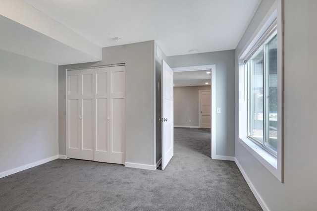 9633 Belmont Ln, Eden Prairie, MN 55347 - unfurnished bedroom with carpet floors and a closet