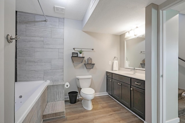 9633 Belmont Ln, Eden Prairie, MN 55347 - bathroom with a bath, vanity, wood finished floors, a shower, and a textured ceiling