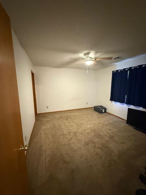 625 Meeker Ct NW, Evansville, MN 56326 - unfurnished room with ceiling fan and carpet