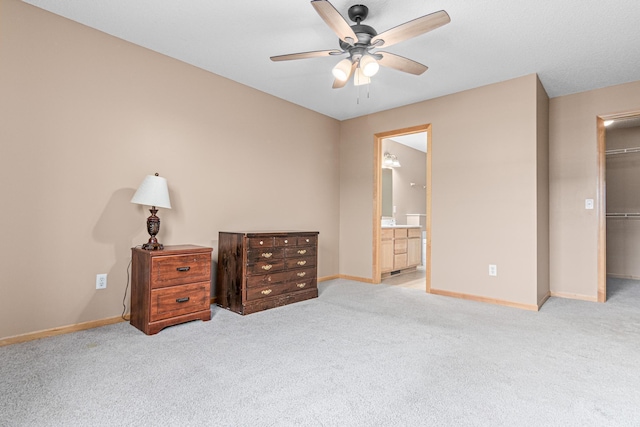 16418 Elm Creek Ln Unit 4027, Lakeville, MN 55044 - bedroom with light colored carpet, a spacious closet, a closet, connected bathroom, and ceiling fan