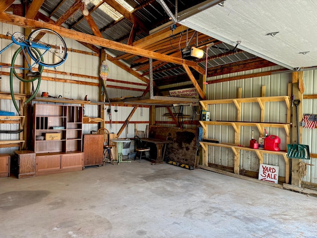 15467 Twilight Rd, Onamia, MN 56359 - garage with a garage door opener and metal wall
