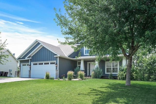 7804 Stafford Trl, Savage, MN 55378 - view of front of property with board and batten siding, an attached garage, concrete driveway, stone siding, and roof with shingles