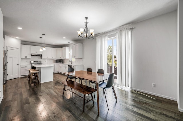 7804 Stafford Trl, Savage, MN 55378 - dining space with dark wood-type flooring, a chandelier, and recessed lighting