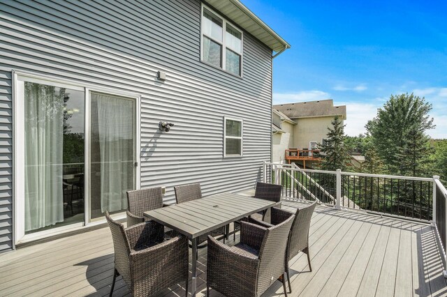 7804 Stafford Trl, Savage, MN 55378 - wooden terrace with outdoor dining space
