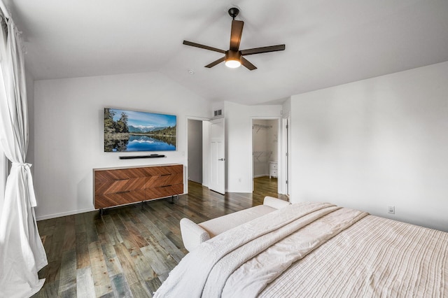 7804 Stafford Trl, Savage, MN 55378 - bedroom with wood finished floors, lofted ceiling, ceiling fan, and a walk in closet