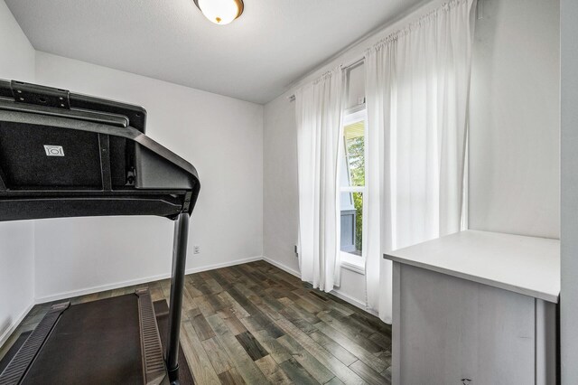 7804 Stafford Trl, Savage, MN 55378 - exercise area featuring dark wood-style floors and baseboards