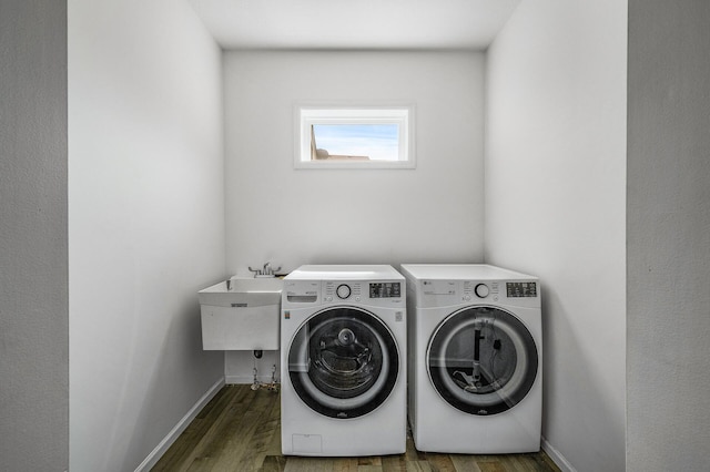 7804 Stafford Trl, Savage, MN 55378 - laundry area featuring independent washer and dryer and wood finished floors