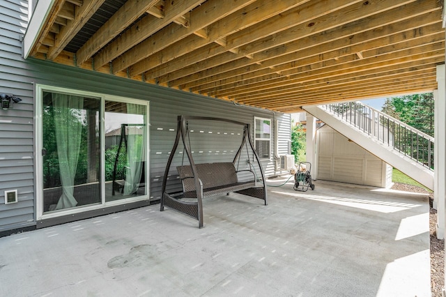 7804 Stafford Trl, Savage, MN 55378 - view of patio / terrace featuring stairway and cooling unit