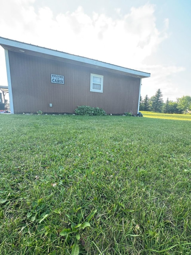 34463 Green Valley Rd SE, Woodside Twp, MN 56736 - view of side of home featuring a lawn