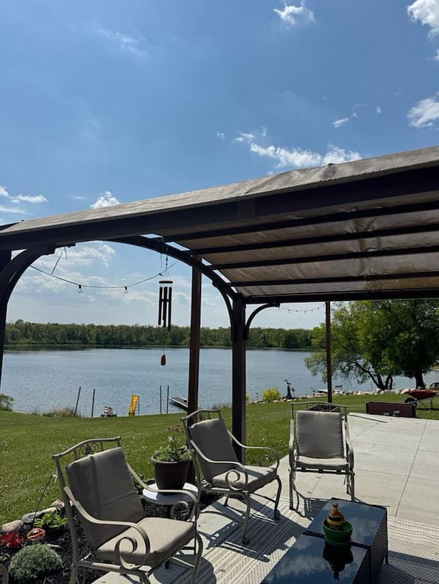 34463 Green Valley Rd SE, Woodside Twp, MN 56736 - view of patio featuring a water view