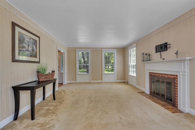 426 Armstrong Ave, Litchfield, MN 55355 - unfurnished living room with a fireplace, light colored carpet, and wooden walls