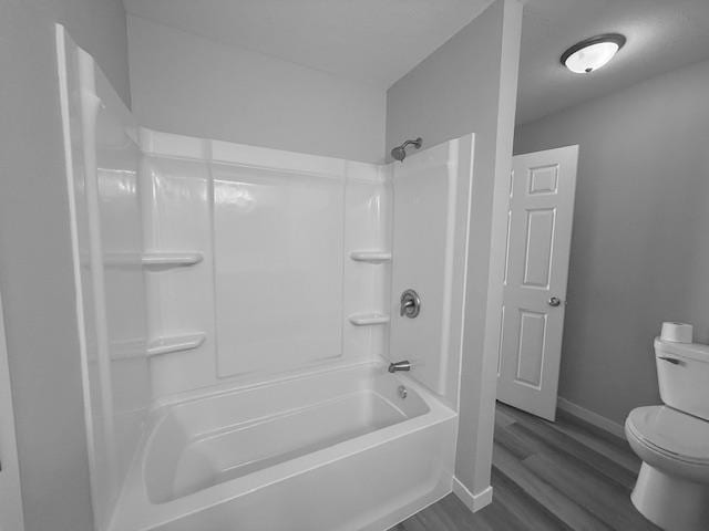 1312 Natures Trl, Alexandria, MN 56308 - full bath featuring shower / washtub combination and wood finished floors