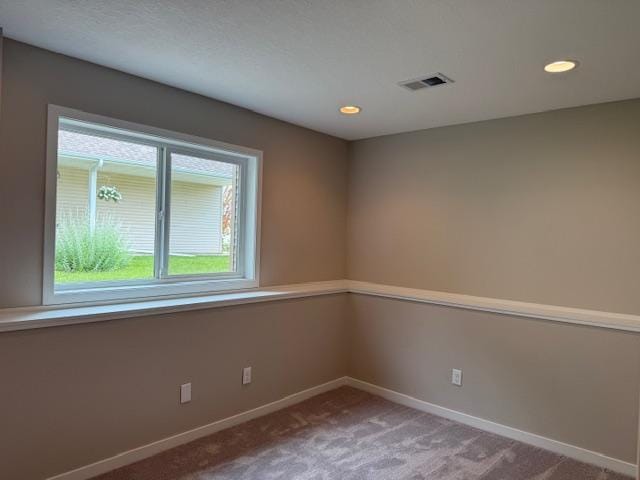 1312 Natures Trl, Alexandria, MN 56308 - carpeted empty room with baseboards and recessed lighting