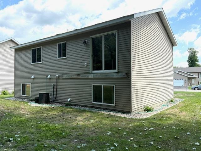 1312 Natures Trl, Alexandria, MN 56308 - rear view of property with a lawn